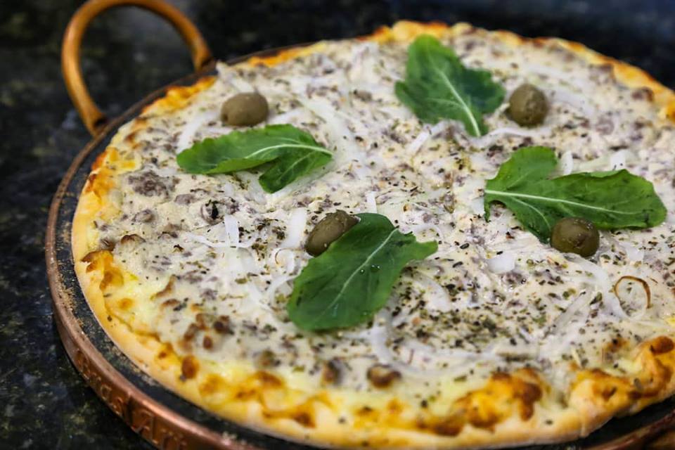 Peça as pizzas do Caprica para o seu encerramento de fim de ano em Jaraguá do Sul